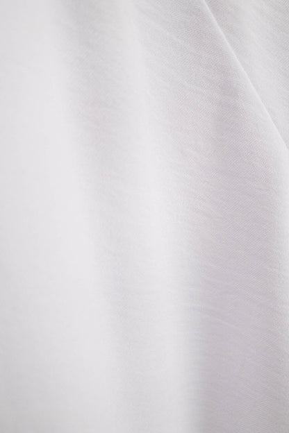 WELCOME White Dresses Leigh Schubert